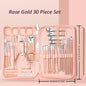 Portable stainless steel manicure set with 30 nail clippers, scissors, and trimming tools for professional finger and toenail care.