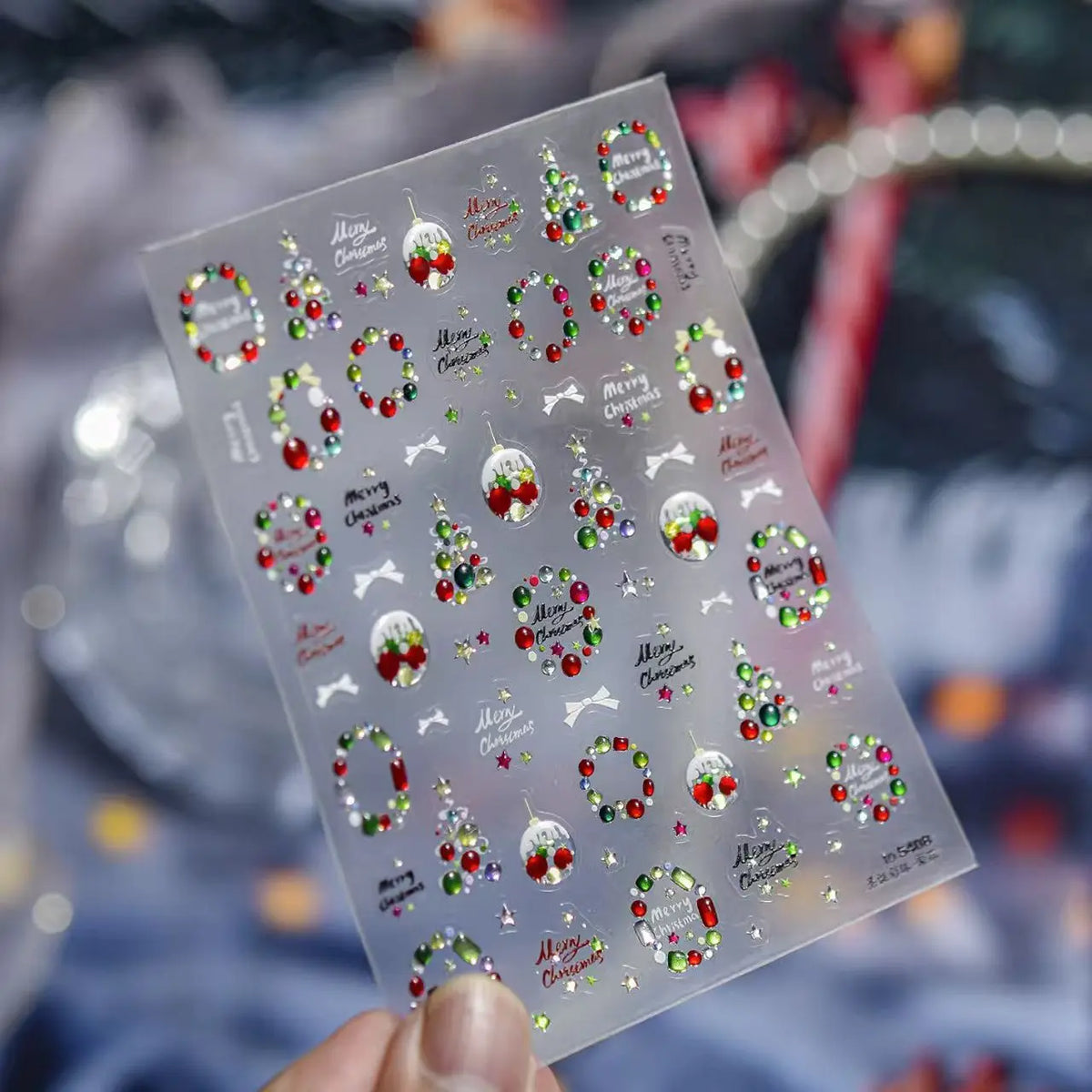 Silver Christmas nail stickers featuring snowflakes and Christmas trees, perfect for winter manicure with Blushimmer self-adhesive nail decals.
