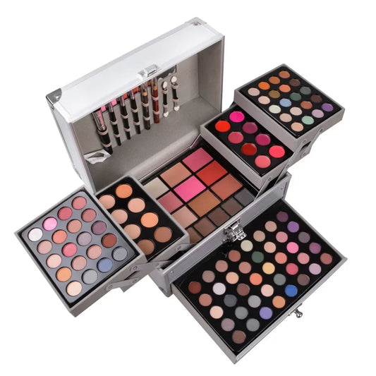Blushimmer makeup gift set for women with face powder, eyeshadow palette, lipstick, highlighter, bronzer, and makeup brushes.