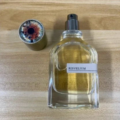 Blushimmer luxury unisex perfume Eau De Parfum with woody, aquatic, and leather notes in a 50ml bottle featuring four fragrance options.