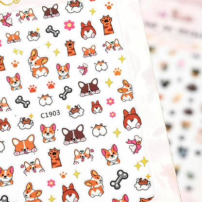 Cute cat and dog 3D nail decals from Blushimmer featuring cartoon animal designs for adorable Y2K-inspired nail art.