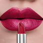 Blushimmer 21-color metallic lipstick featuring shiny, glittery, pearlescent finish in a sleek tube, perfect for bold lip makeup.