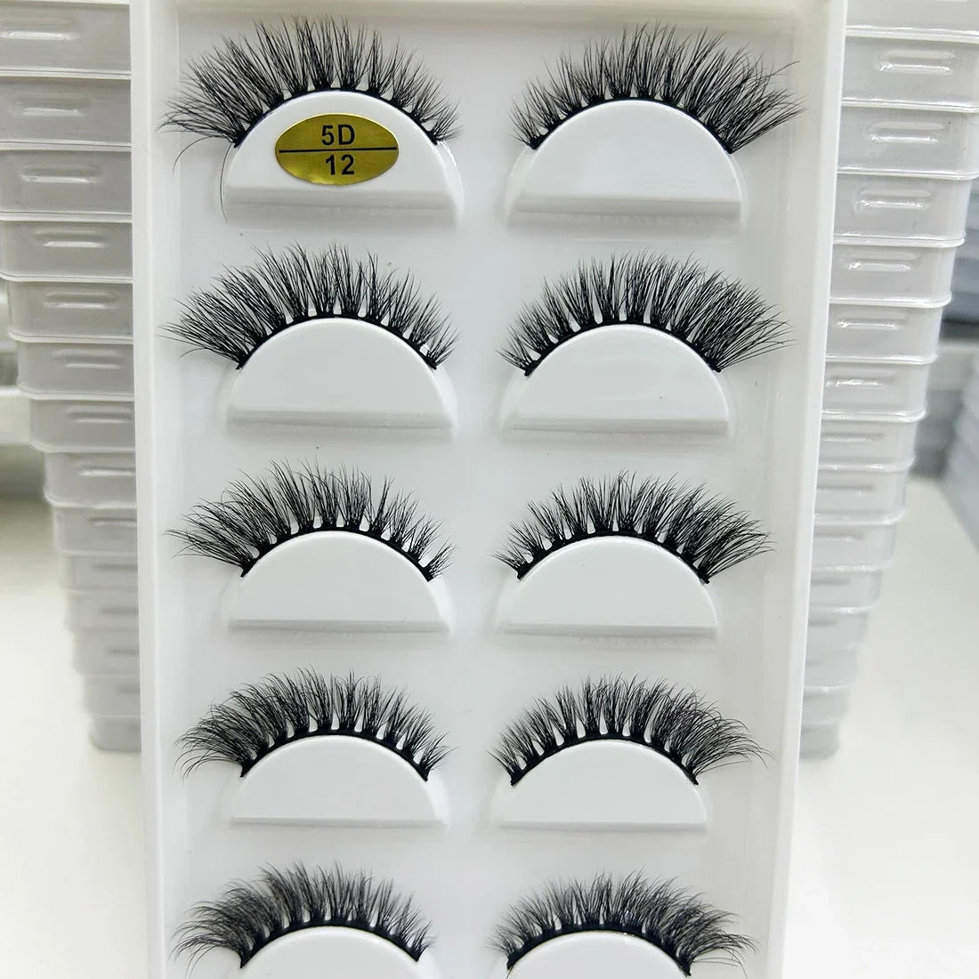 Set of 5 pairs of natural 3D mink false eyelashes by Blushimmer, ideal for makeup and enhancing eye beauty.