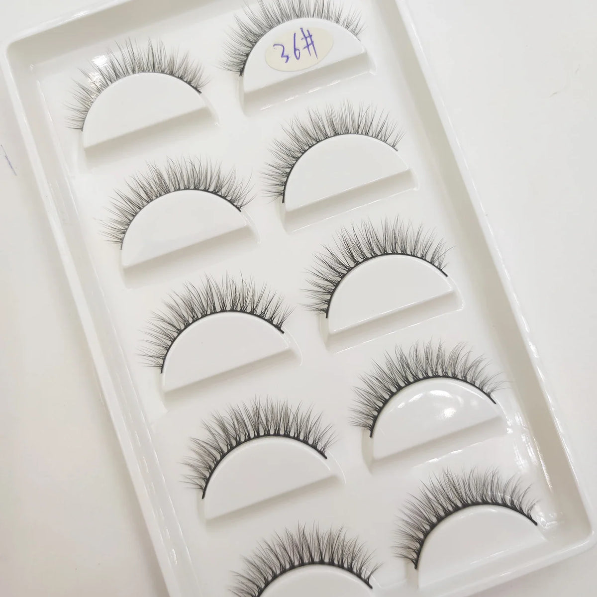 Set of 5 pairs of Blushimmer 3D mink false eyelashes for natural, full eye makeup, shown on a neutral background.