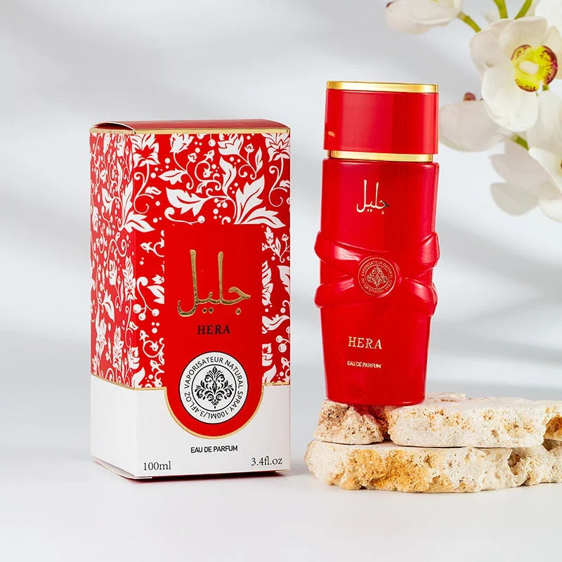 Unisex luxury Arab perfume spray with floral, fruity, spicy, and musk notes, featuring elegant fragrance bottle by Blushimmer.