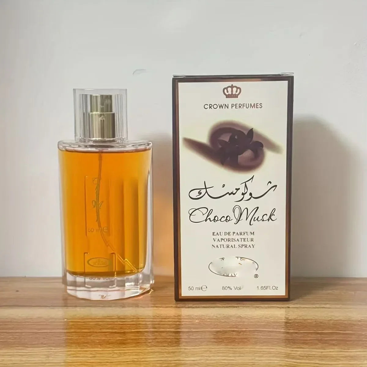 Blushimmer women's luxury perfume bottle with chocolate, musk, rose, and vanilla notes in elegant fragrance packaging.