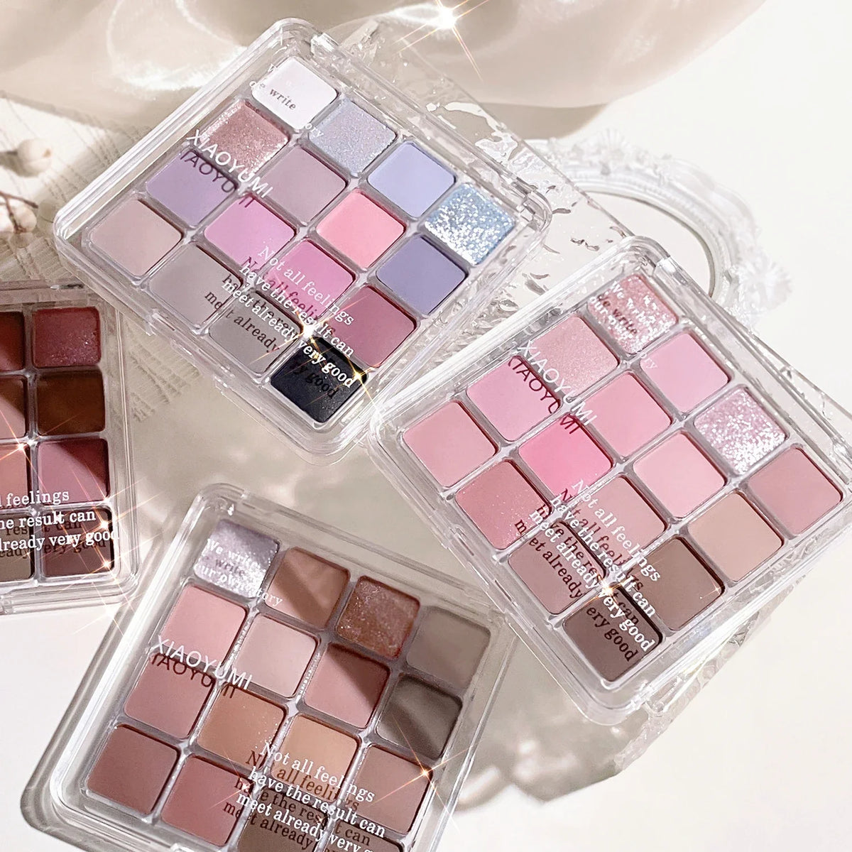 Blushimmer sixteen-color sunset magic eye shadow palette with pearl and matte earth tones for Korean makeup looks.