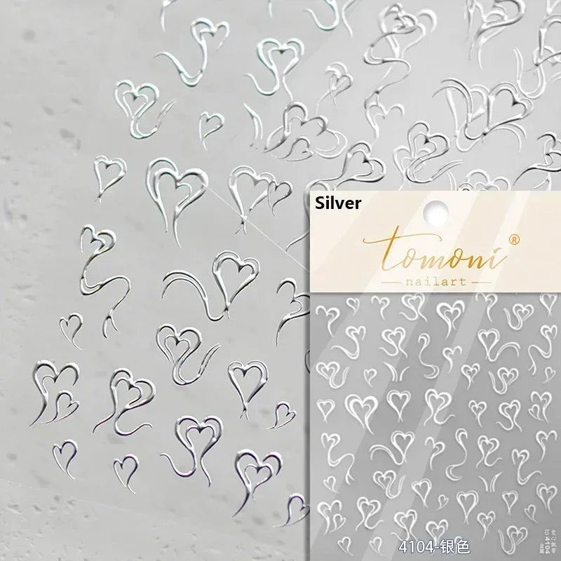 Colorful Cat's Eye 5D gradient European love heart gem nail art stickers with crystal, wing, and geometric designs for manicure decorations.