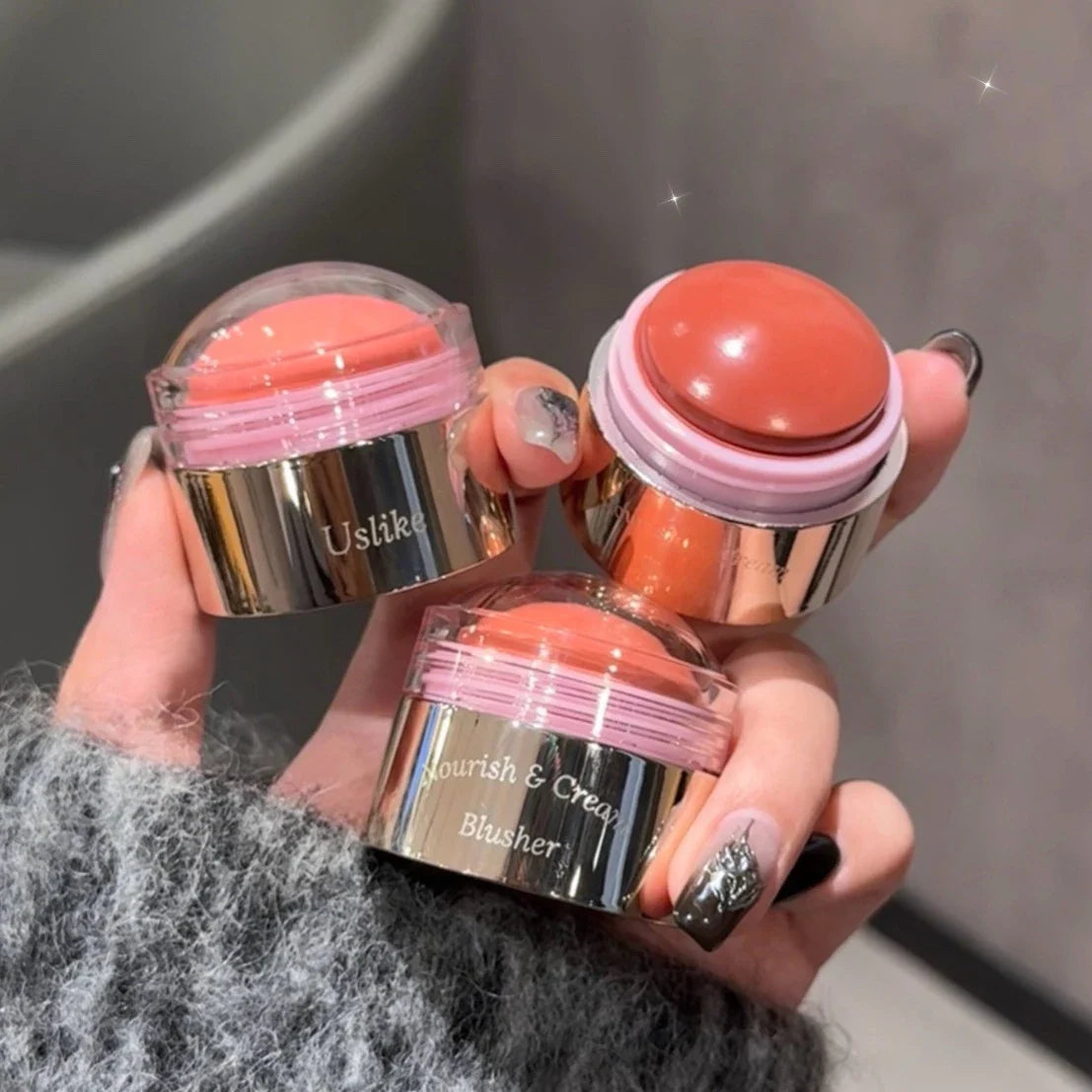 Blushimmer purple blush stick with peach pink shade, creamy face blush for brightening, contouring, and rosy cheeks.