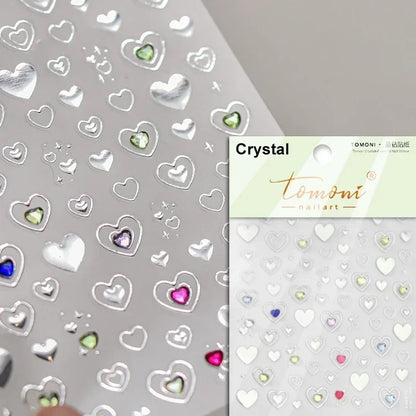 Colorful Cat's Eye 5D gradient European love heart gem nail art stickers with wing and geometric shapes, self-adhesive for manicures.