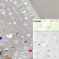 Colorful Cat's Eye 5D gradient European love heart gem nail art stickers with wing and geometric shapes, self-adhesive for manicures.