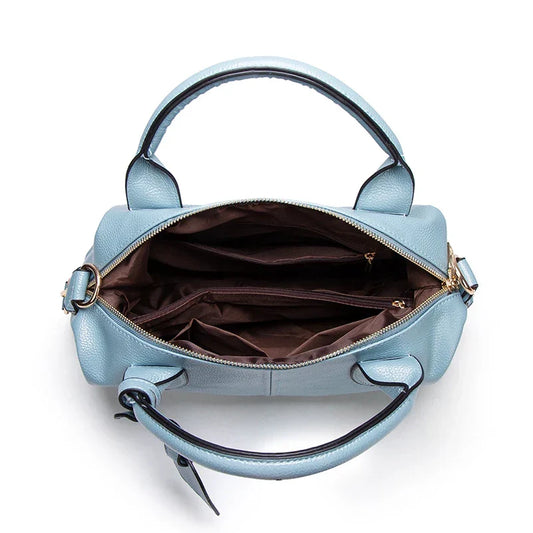 Large capacity oil wax leather tote bag for women, stylish shoulder bag from OBA with durable leather finish and spacious interior.