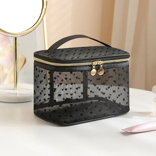 Black mesh cosmetic bag by Blushimmer with double layers, large capacity, zipper closure, ideal for travel and makeup organization.