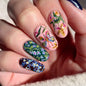 Glossy almond-shaped false nails by Blushimmer in dark green with mushroom pattern, gold sequins, and French style design.