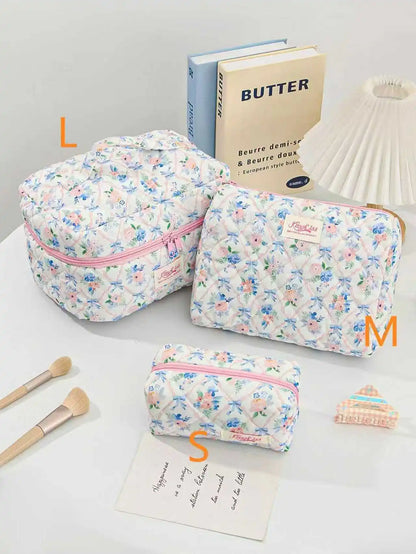 Cute quilted cotton makeup bag by Blushimmer with zipper closure, portable cloth organizer for cosmetics and toiletries.