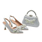 Elegant women's pointed toe wedding shoes and matching bag set by EdleessFashion, with sleek design and luxurious finish.