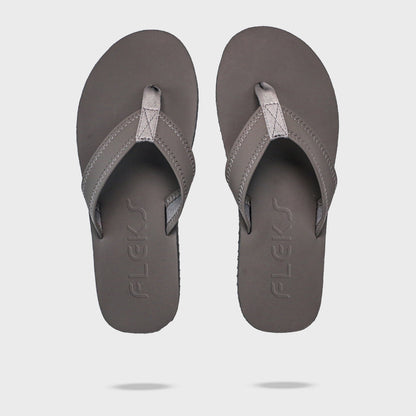 Pair of Fleks Seagrove Flip Flops in Nightfall color, top-down view showing the logo and comfortable sandal design.