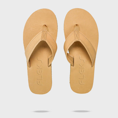 Pair of Seagrove Flip Flop sandals in sand color by Fleks, showing the top view with logo on the footbed.