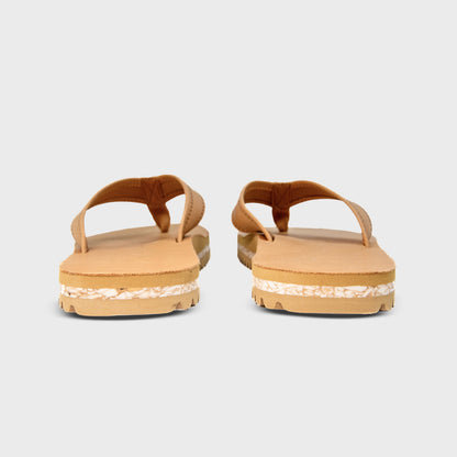 Rear view of Fleks Seagrove Flip Flop in sandy color, showing the comfortable strap design and textured sole.