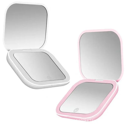 Blushimmer mini portable folding makeup mirror with LED lights, magnifying compact vanity mirror for travel and beauty touch-ups.