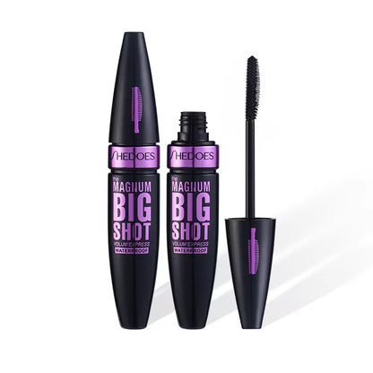 Black waterproof lengthening mascara by Blushimmer with thick, long-lasting black formula, shown in a sleek tube on a white background.