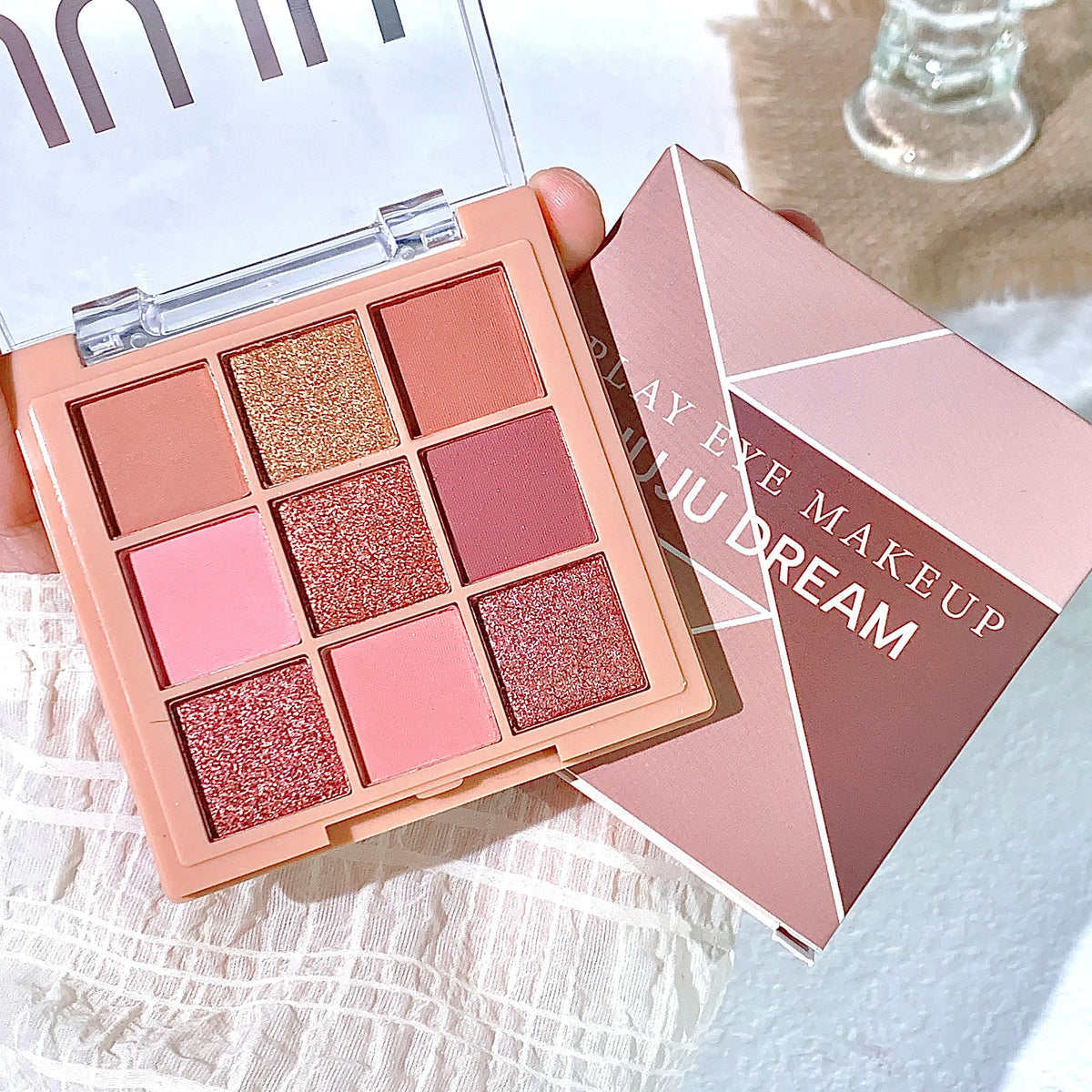 Blushimmer warm winter brown eyeshadow palette with nine earth tone shades including orange and milk tea colors.