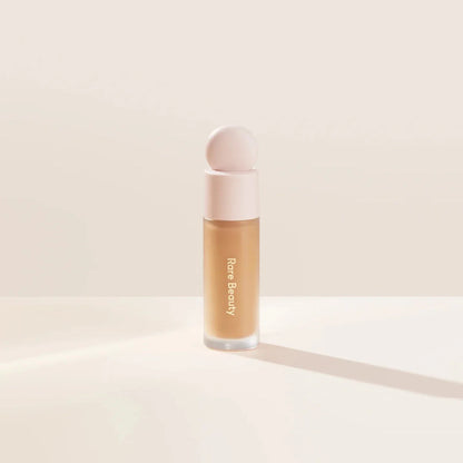 Blushimmer Rare Beauty liquid contour luminizer and blush face makeup with shimmer and shine for highlighting and contouring.