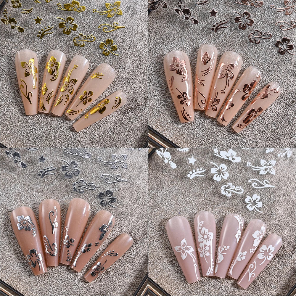 White and black 3D hibiscus flower nail stickers by Blushimmer with pink and gold floral decals for nail art decoration.