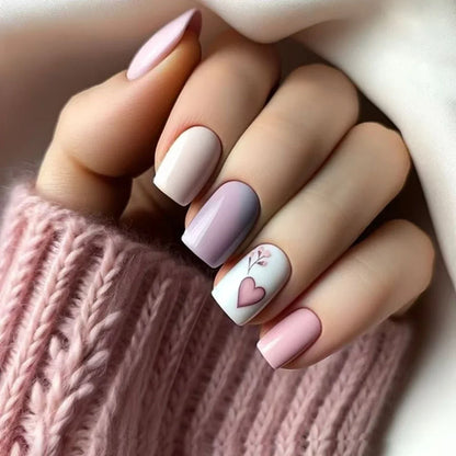 Set of 24 short square fake nails by Blushimmer with halo dyed gradient hearts and colorful French tips design.