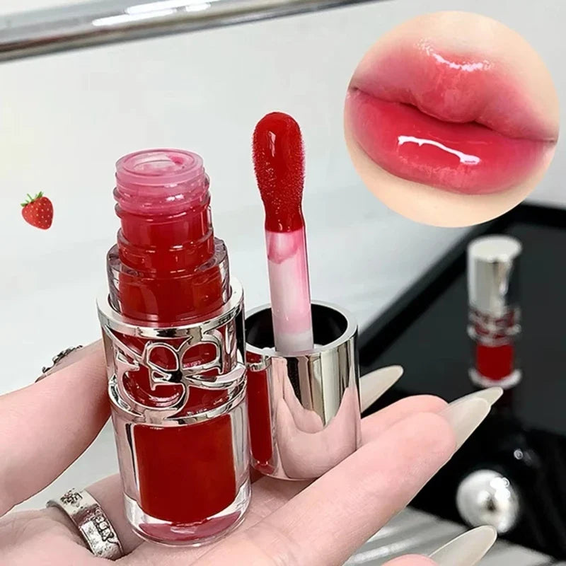 Blushimmer clear glass shine lip gloss with a watery, moisturizing finish and juicy tint for plump, long-lasting lips.
