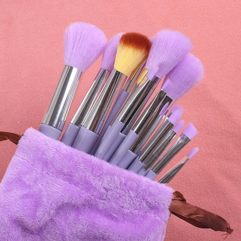 Set of 13 Blushimmer makeup brushes including eye shadow, foundation, blush, and beauty tools in a soft makeup bag.