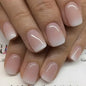 Set of 24 Blushimmer square head fake nails with pink-white gradient French press design and jelly glue, short full cover false nail tips.