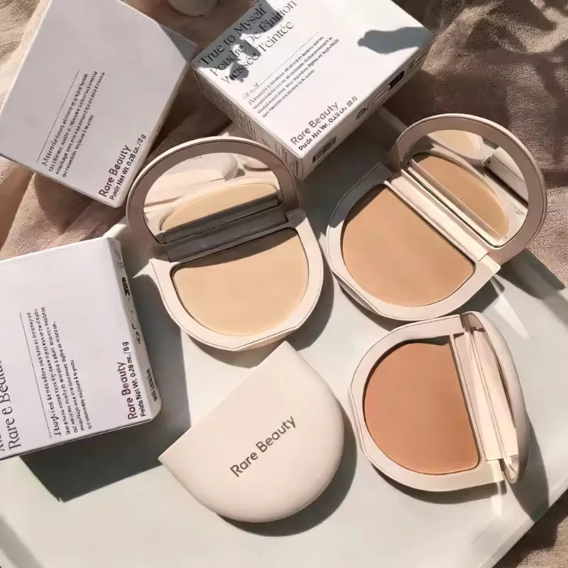 Blushimmer Rare Beauty pressed powder with matte, waterproof, oil-control finish and fine, talc-free finishing powder for facial makeup.