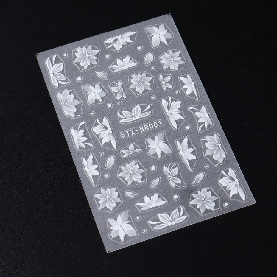 3D white flower nail art stickers by Blushimmer featuring cute floral acrylic decals for DIY nail decoration and charm accessories.