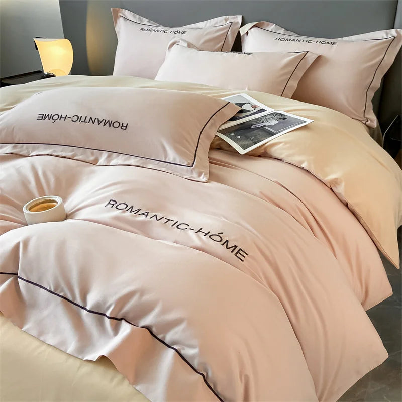 Luxury cotton bedding set with duvet cover, bed sheet, and pillowcases in solid colors for king, queen, full, and twin beds.