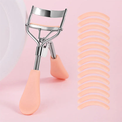 Blushimmer portable eyelash curler with stainless steel body and 15 silicone pads, used for eyelash extension and curling.
