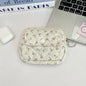 Cute cartoon Blushimmer travel cosmetic pouch with lipstick, earphone, and card storage compartments for women.