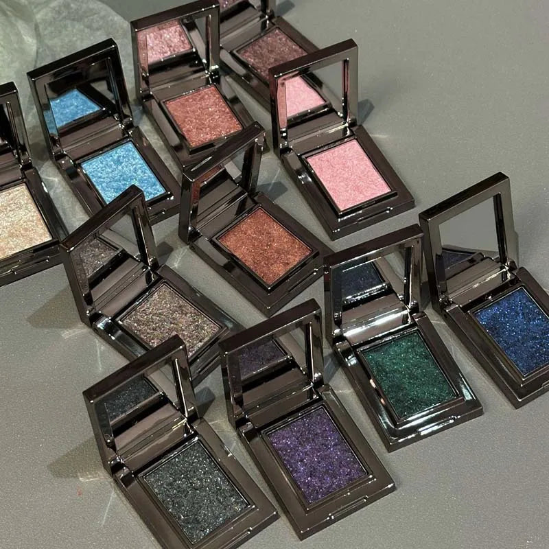 Blushimmer metallic glitter pearlescent eyeshadow cream with chameleon sparkling finish and shimmer highlighter for brightening eyes.