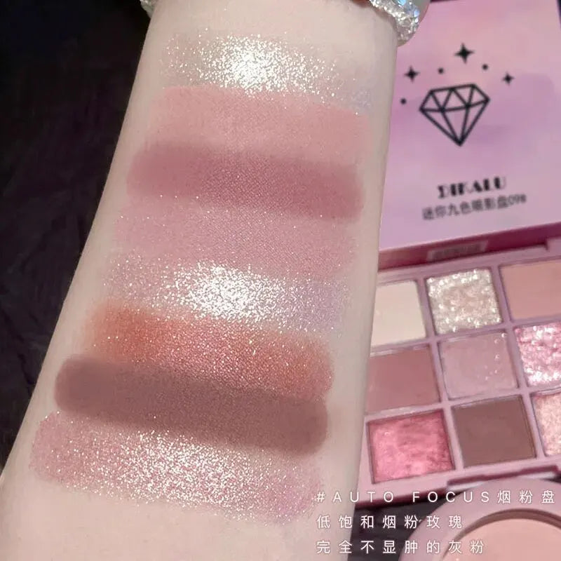 Blushimmer DIKALU spring and summer eyeshadow palette with rosy shades, nine-pan grid featuring smoke powder and soft, low-saturation colors.