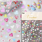 Colorful Cat's Eye 5D gradient European love heart gem nail art stickers by Blushimmer on clear backing for stylish manicures.