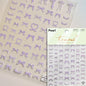 White and black French leopard print bowknot nail art stickers with rhinestones and pearls, perfect for elegant manicure decoration.