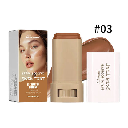 Blushimmer Skin Tint Foundation Stick with concealer and serum in a sleek bronze compact, showcasing its smooth, high-coverage formula.