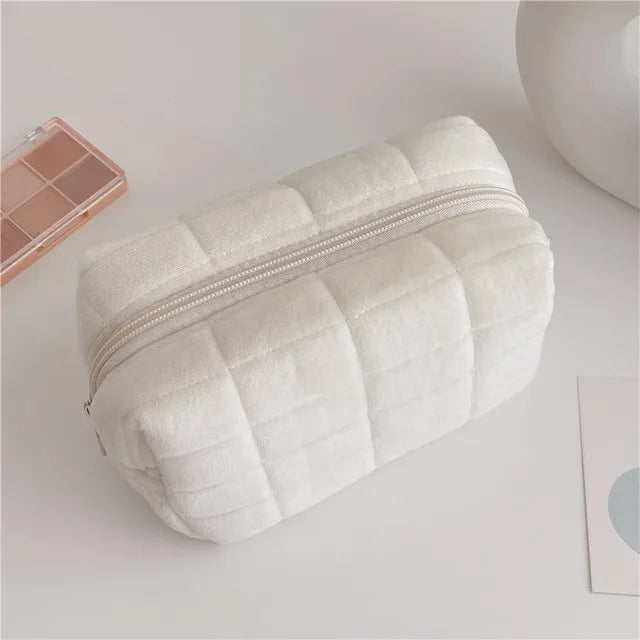Large Blushimmer solid fur cosmetic storage bag with zipper, ideal for makeup, toiletries, and stationery organization.