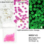 White acrylic flower nail art decorations with mixed size rhinestones and colorful gems for DIY manicure design.
