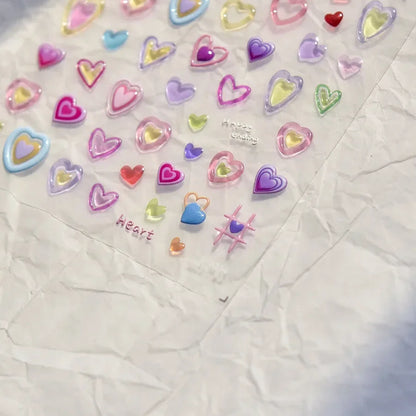 Colorful Cat's Eye 5D Gradient European love heart gem nail art stickers with wing and geometric designs for manicure decoration.