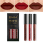Set of three waterproof liquid lipsticks in red, blue, and purple matte shades by Blushimmer with nude tint and long-lasting formula.
