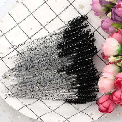 Set of 5/50 Blushimmer eyelash and eyebrow brushes with mascara wands and spoolers for false eyelash extensions and cosmetics.