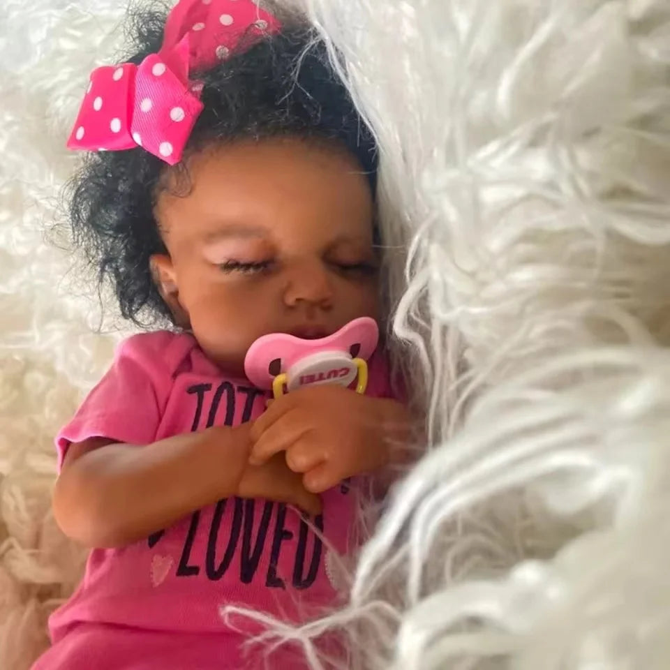 Black Reborn Baby Doll by Risbecko, 20-inch lifelike African American doll with soft cloth body, perfect for birthday or Christmas gift.