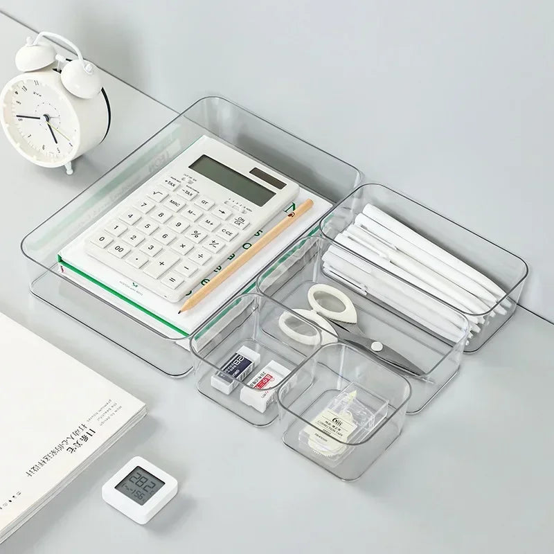 Clear plastic storage box by Blushimmer, desk organizer for jewelry, makeup, and small items with drawer compartments.