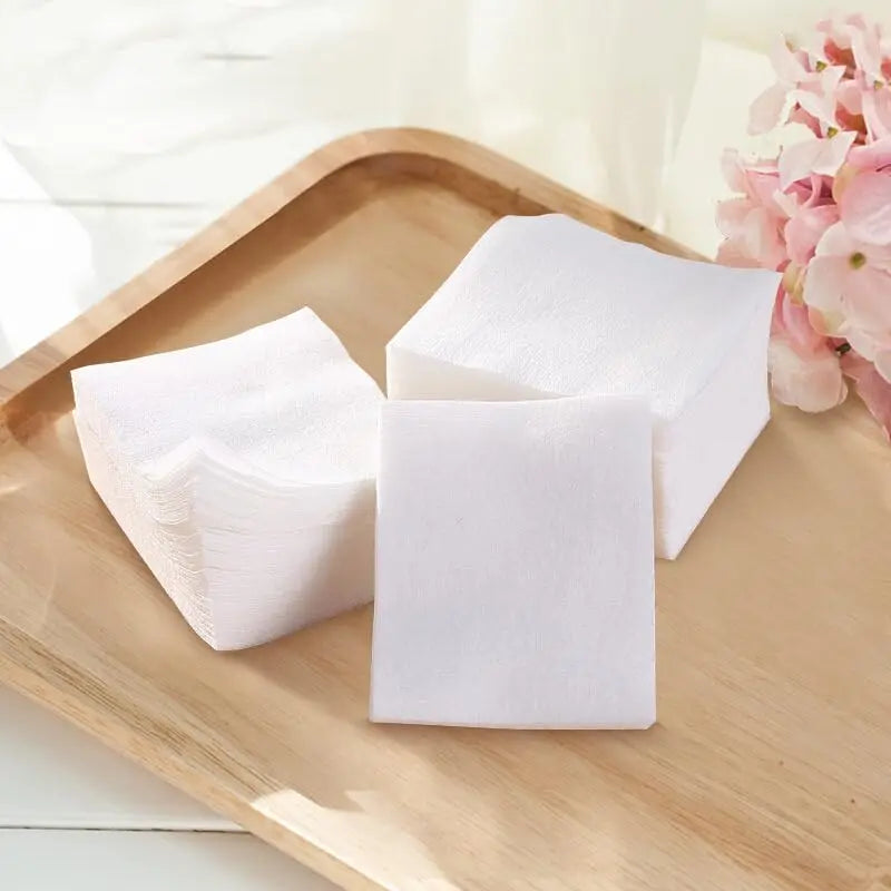 Set of 1200 disposable pearl pattern makeup cotton pads by Blushimmer, soft facial cleansing and makeup removal wipes.